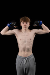 Naklejka premium A Shirtless Teenager Boxer