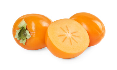 Whole and cut persimmon fruits isolated on white