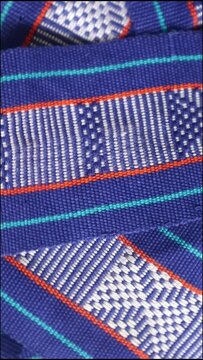 Handmade woven with unique pattern from Indonesia, close up textured fabric background