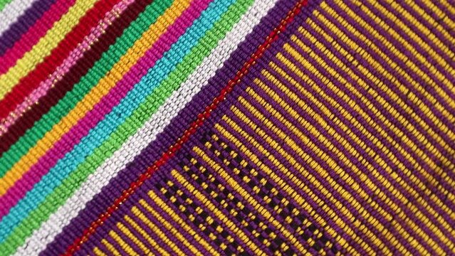 Handmade woven with unique pattern from Indonesia, close up textured fabric background