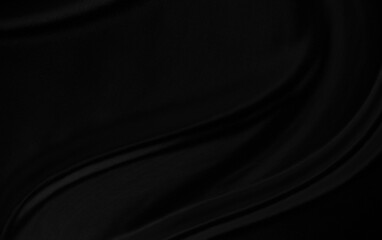 Black gray satin dark fabric texture luxurious shiny that is abstract silk cloth background with...