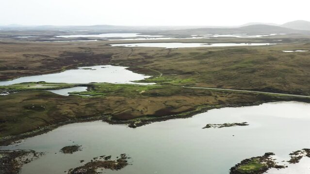 North Uist, Outer Hebrides, Scotland. Video aerial pano South to North over scattered islands of tidal Loch Maddy from Loch an Duin