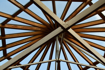 Wooden beam ceiling. Center sunlight.