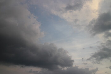 Obraz premium Stormy rain clouds background. Dark sky