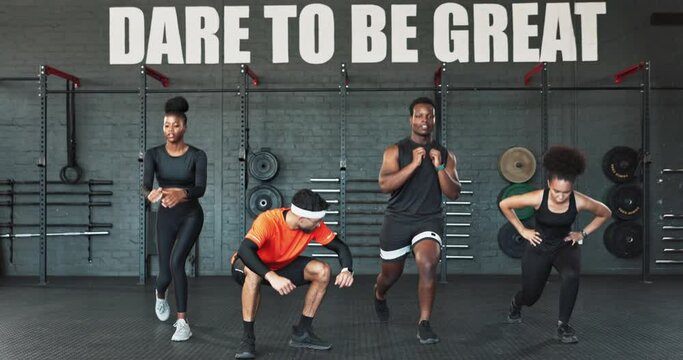 Fitness, class and team in gym training, workout and stretching or squat together with funny nerd. People or friends with balance, support and exercise or sports by dare to be great quote and text