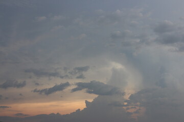 Beautiful Vivid sky painted by the sun leaving bright golden shades. Image of cloud sky on evening time. Evening Vivid sky with clouds.