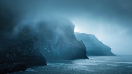 Heavy blue fog mist over seashore cliffs, seascape, dark, moody, melancholy, background, Celtic, Ireland - Powered by Adobe