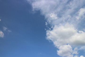 Blue sky with white clouds. Blue background. The summer sky is colorful clearing day and beautiful nature in the morning. for backdrop decorative and wallpaper design. The perfect sky background.