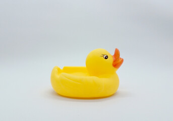 Rubber toy duck. Cute yellow toy duck. 
Toy duck on a white background.