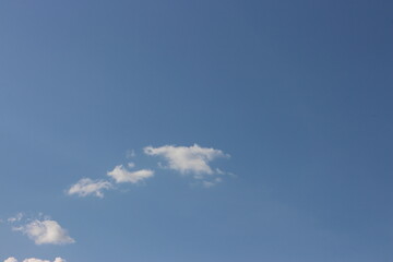 Blue sky with white clouds.