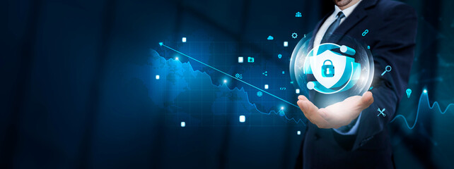 Cybersecurity: Businessman Hand Holding Virtual Cybersecurity Icon with Technological Icons. Data Protection and Network Security.