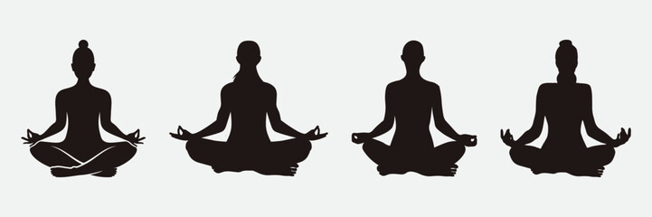 silhouette of a person in yoga position