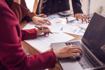 Analyzing startup group meetings to offer advice and make decisions. We assess discussions, offer insights, and assist in reaching conclusions for better business outcomes, hands close up at desk.
