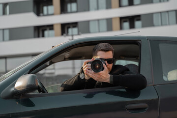 Special agent undercover, taking photos from the car