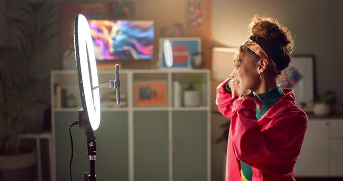 Influencer, talking and woman with phone for live streaming on social media, mobile app and website. Home, content creator and person with ring light on smartphone for internet, networking or vlog