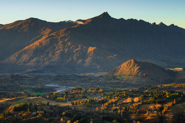 Double Cone peak, The Remarkables mountain range with villages in the morning, autumn, Queenstown,...