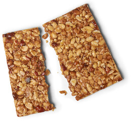 sweet peanut brittle isolated white background, vegetarian healthy sweet peanut in caramel snack treat with nutty flavor crumbly texture from above