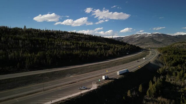 Aerial over interstate 70 in Silverthorne Colorado in springtime