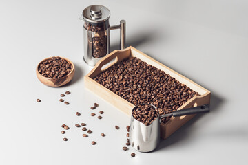 Set of coffee accessories with coffee grains.