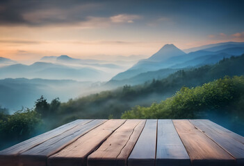 Wooden table overlooking a misty mountain landscape at sunrise, with layers of hills and a soft,...