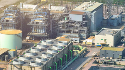 A green power plant minimizes emissions, harnessing renewable resources to reduce its carbon...