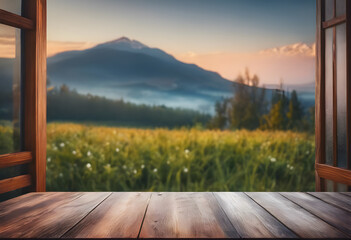 View from a wooden terrace overlooking a misty mountain landscape at sunrise, with a vibrant meadow in the foreground.