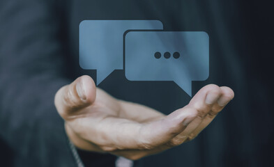 Concept of testimonial and testimony, online chat icon on business hand.
