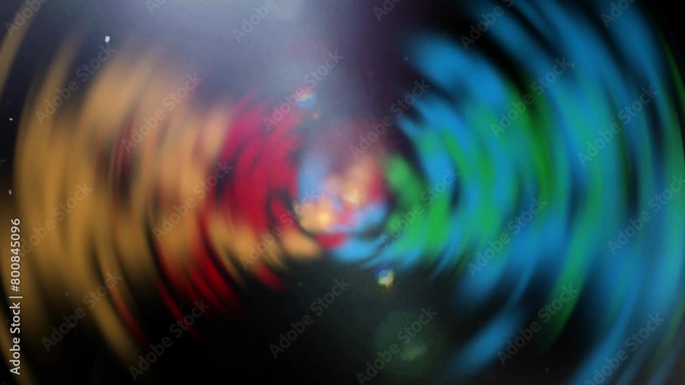 Poster blurry colors in motion with texture effects and sparks and light particles on a black background