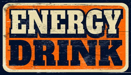 Aged and worn energy drink sign on wood
