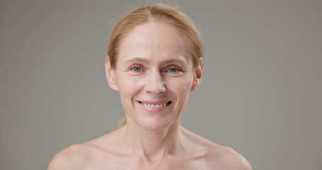 Anti age, Beauty, health and dry skin care concept - beautiful middle-aged mature Caucasian woman...
