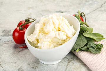 Soft cream cheese in the bowl
