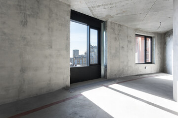 interior of the apartment without decoration in gray colors. rough finish
