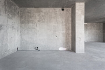 interior of the apartment without decoration in gray colors. rough finish