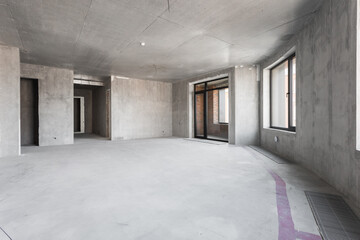 interior of the apartment without decoration in gray colors. rough finish