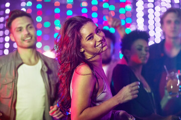 Portrait, dancing and woman, nightclub and party with friends, smile and celebration for birthday,...