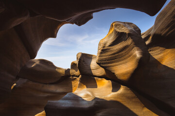 Ancient sandstone formations similar to canyons in Arizona, background travel concept