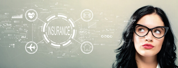 Insurance concept with young businesswoman in a thoughtful face
