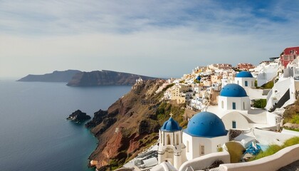 Santorini, Greece: Famous for its whitewashed buildings, blue-domed churches, and dramatic cliffs overlooking the Aegean Sea