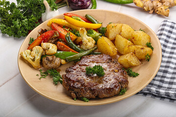 Roasted beef steak with potato