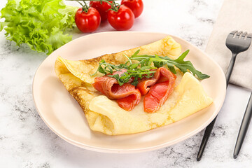 Russian pancake with salmon fish