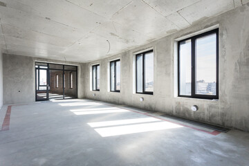 interior of the apartment without decoration in gray colors. rough finish