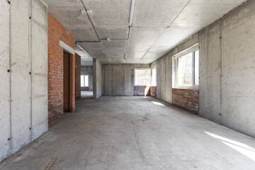 interior of the apartment without decoration in gray colors. rough finish