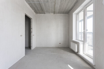 interior of the apartment without decoration in gray colors. rough finish