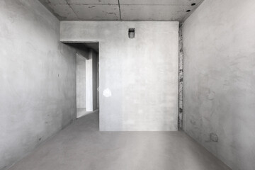 interior of the apartment without decoration in gray colors. rough finish