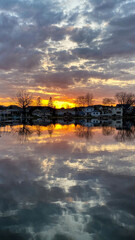 Sunset over Yarhara River Channel with Water Reflections in Madison Wisconsin