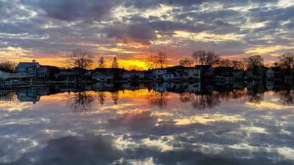 Sunset over Yarhara River Channel with Water Reflections in Madison Wisconsin
