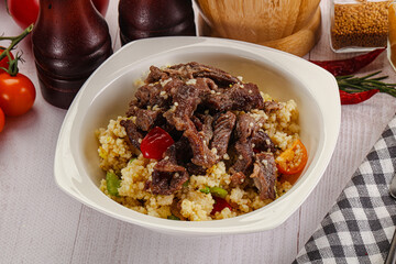 Traditional couscous with beef and vegetables