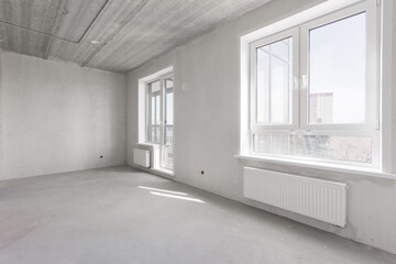 interior of the apartment without decoration in gray colors. rough finish