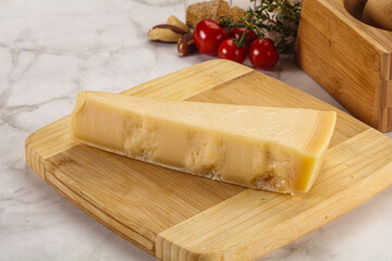 Hard parmesan cheese piece triangle