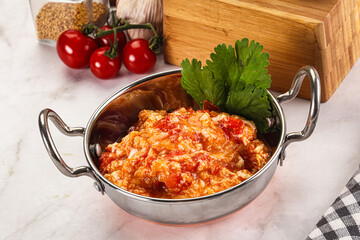 Shakshuka with tomato for breakfast